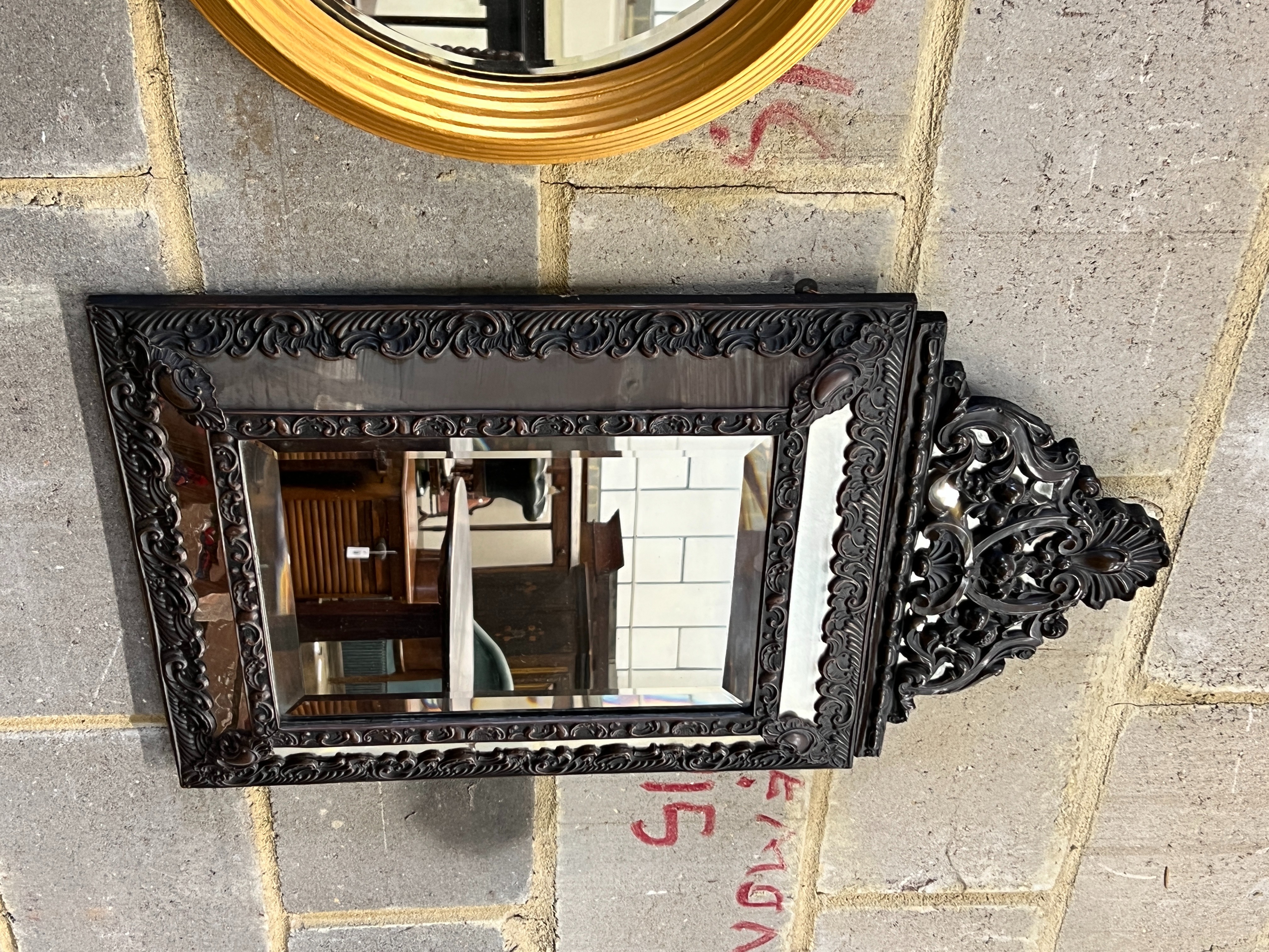 A 19th century style French embossed metal wall mirror, width 43cm, height 72cm together with a circular gilt framed wall mirror